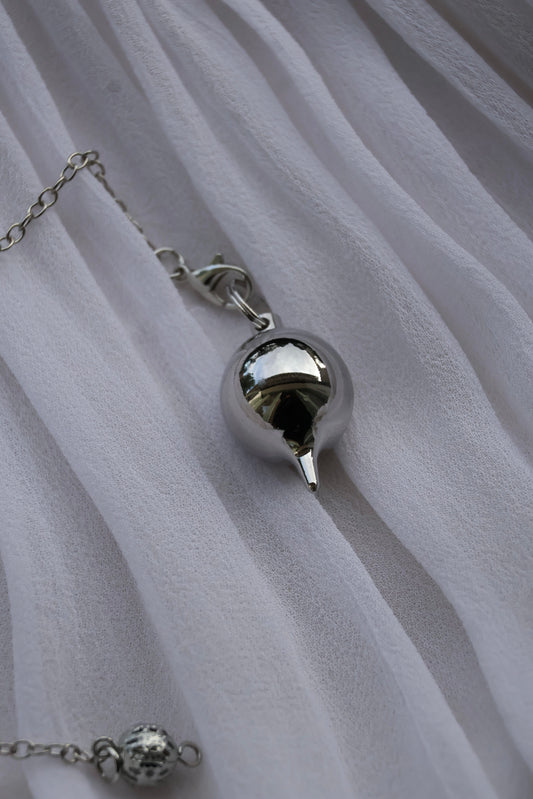 Pendule métal
